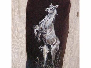 Rearing Horse on feather mounted on wood