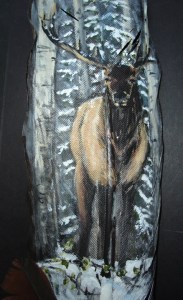 Elk in winter on feather