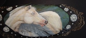 Horse head on feather