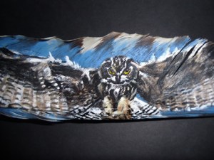 Owl in Flight on feather