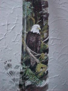 Eagle in tree painted on feather