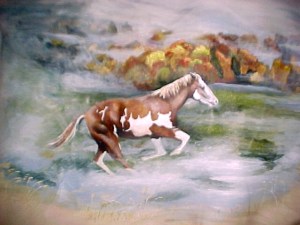 Close-up deer hide painting of a paint horse