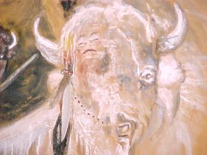 close-up of White Buffalo Calf Woman legend painted on deer hide