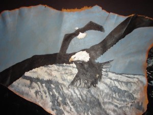 Soaring Eagles on deer hide scrap